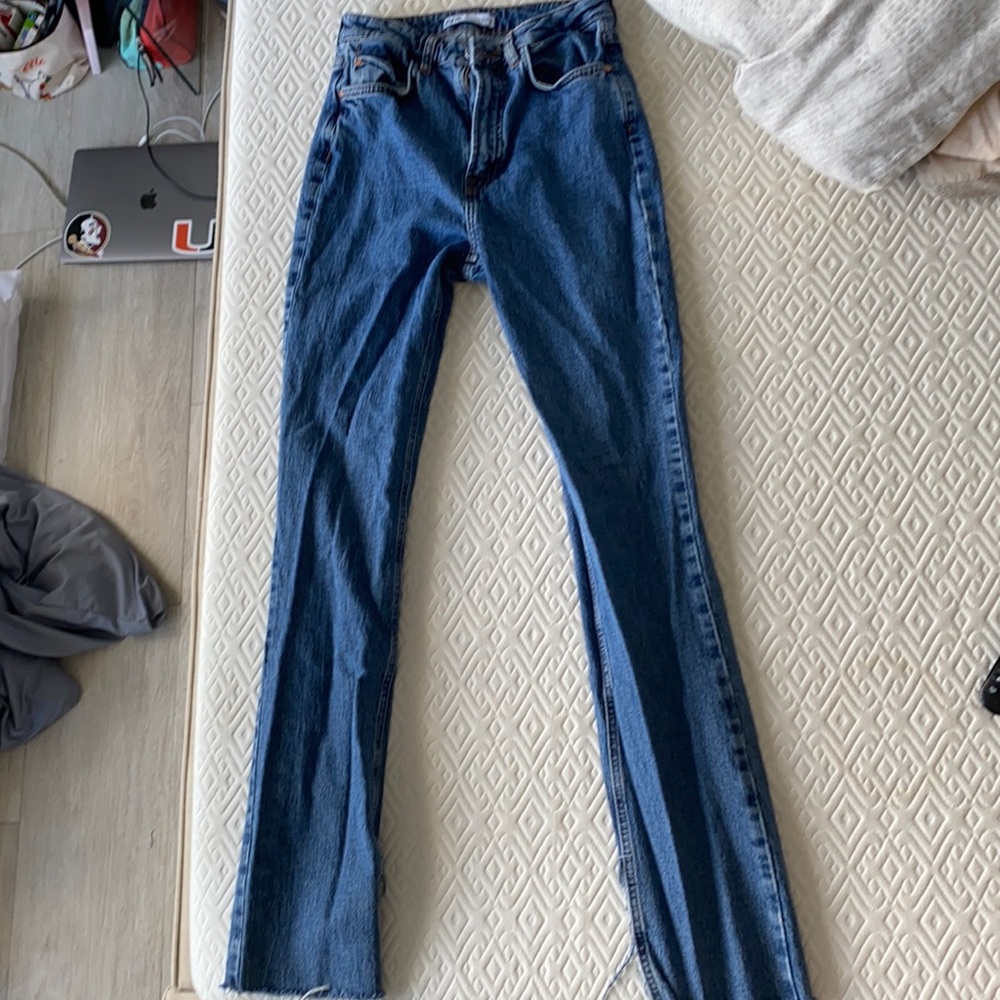 Zara flare jeans with cut at the bottoms